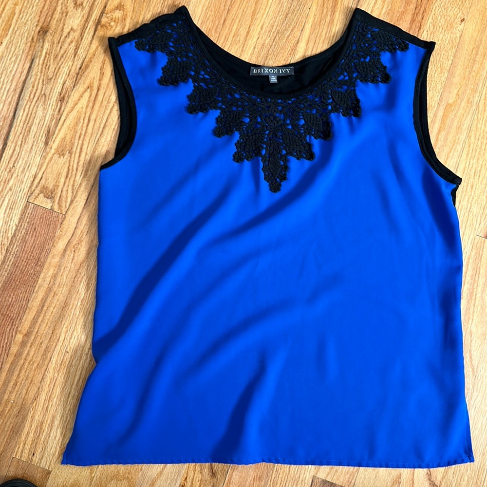 Beautiful bright blue with black detail sleeveless blouse